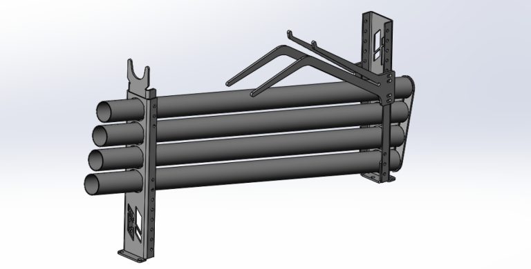 Redskapshållare med kompakt design som monteras mellan hytt och påbyggnation.